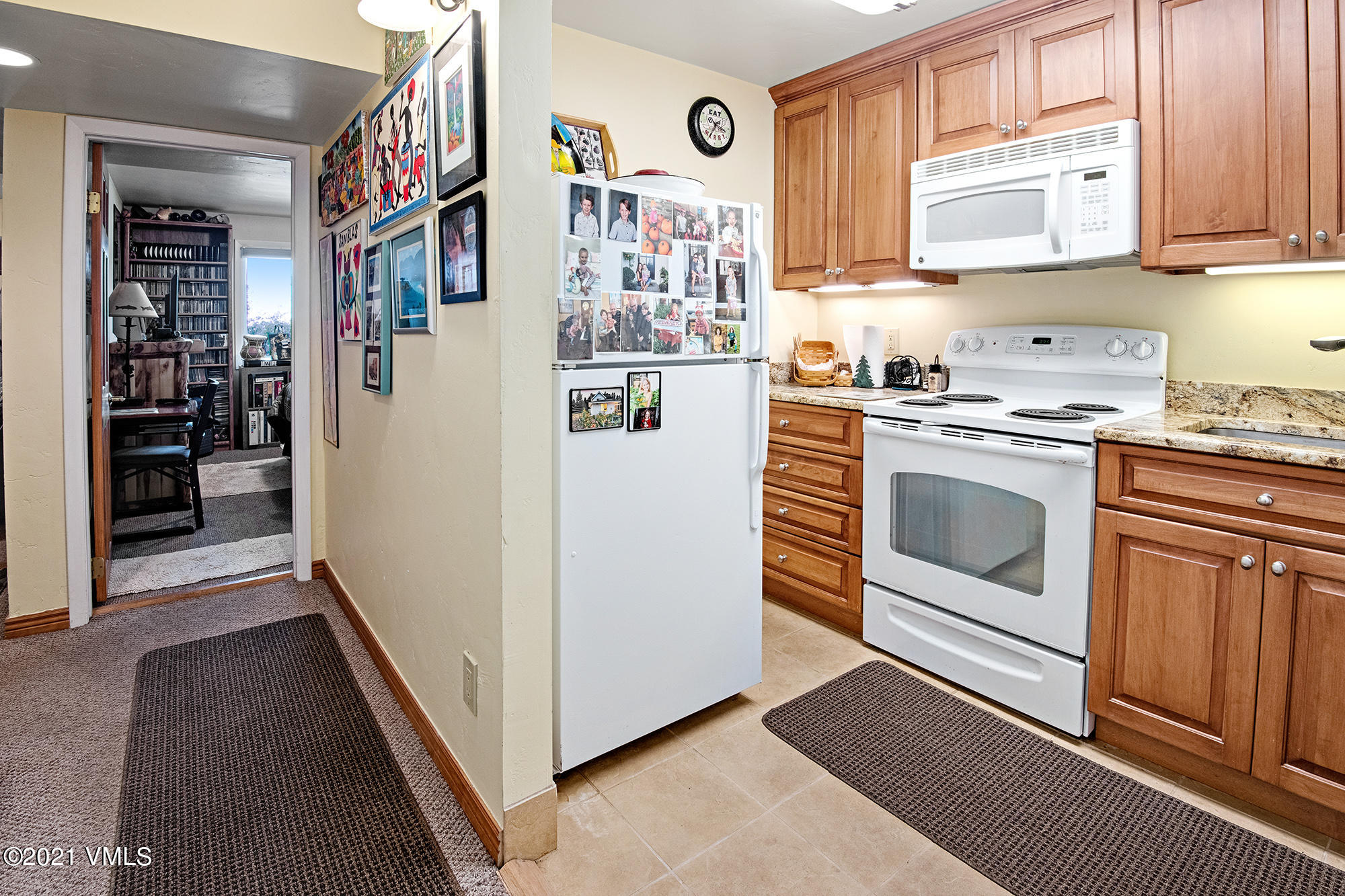 683 Eagle Crest Road Edwards, CO 81632 - Photo 35 of 47 a kitchen with stainless steel appliances granite countertop a refrigerator and a stove top oven