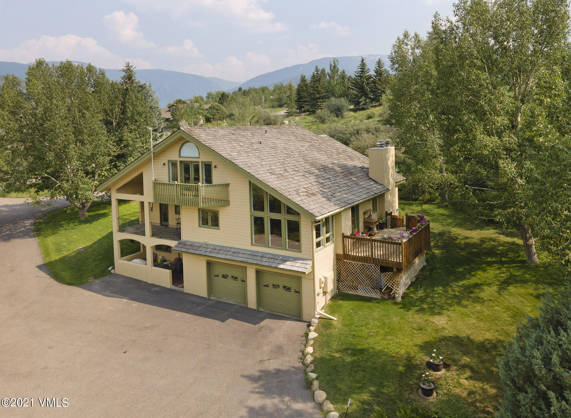 683 Eagle Crest Road Edwards, CO 81632 - Photo 43 of 47 an aerial view of a house with a yard