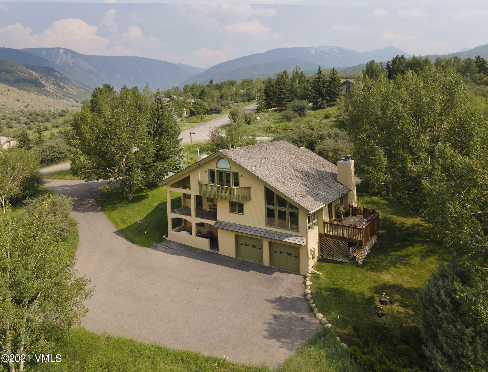 683 Eagle Crest Road Edwards, CO 81632 - Photo 44 of 47 an aerial view of a house with a big yard