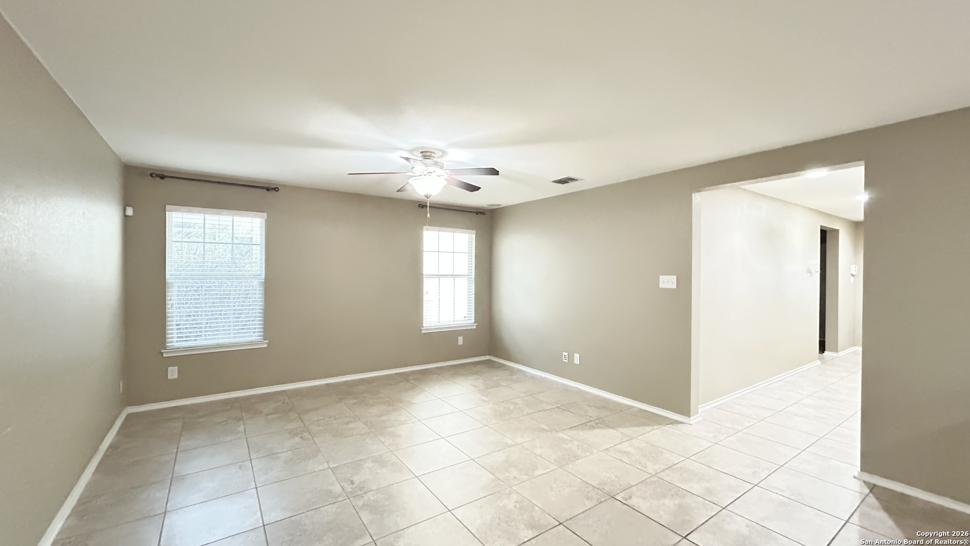 10319 Roadrunner Ridge San Antonio, TX 78245 - Photo 16 of 35 a view of an empty room with window