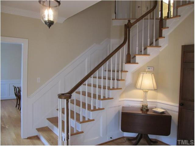 10037 Old Warden Road Raleigh, NC 27615 - Photo 3 of 25 a view of entryway and hall with wooden floor