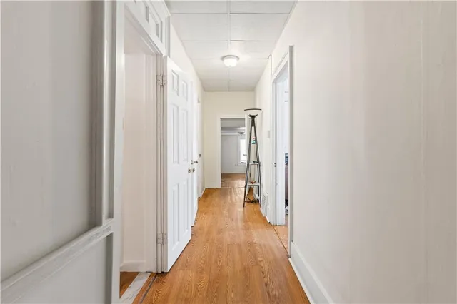 a kitchen with a stove a table and chairs