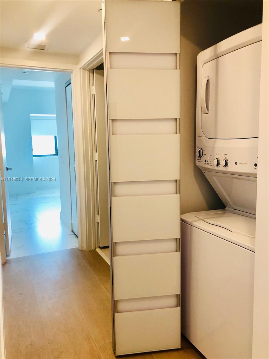 3131 Northeast 7th Avenue, Unit 3305 Miami, FL 33137 - Photo 16 of 44 a utility room with dryer and washer