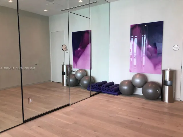 a view of a room with gym equipment