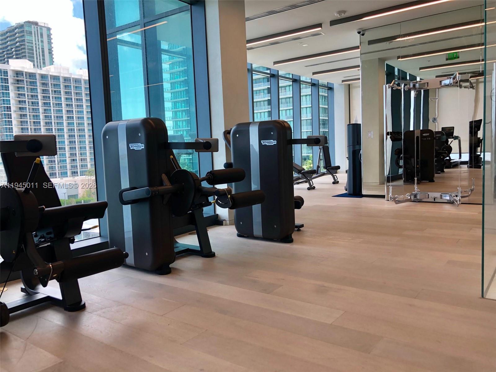 3131 Northeast 7th Avenue, Unit 3305 Miami, FL 33137 - Photo 29 of 44 a view of a livingroom with furniture and windows