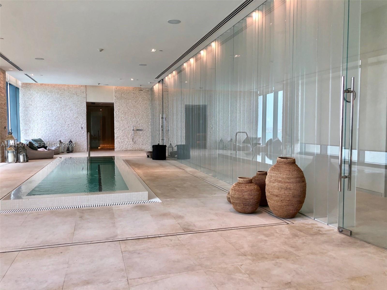 3131 Northeast 7th Avenue, Unit 3305 Miami, FL 33137 - Photo 32 of 44 a large room with window