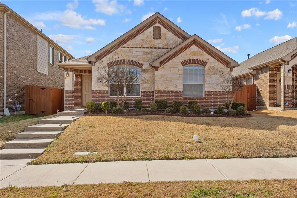 4011 Springfield Lane Crandall, TX 75114 - Photo 1 of 27 a front view of a house with a yard