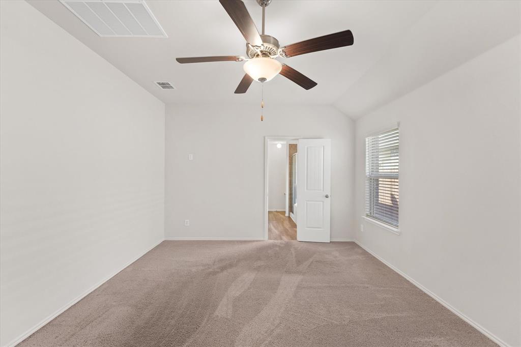 4011 Springfield Lane Crandall, TX 75114 - Photo 14 of 27 a view of an empty room with a window