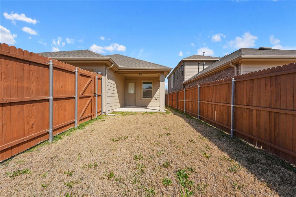 4011 Springfield Lane Crandall, TX 75114 - Photo 26 of 27 a view of a backyard