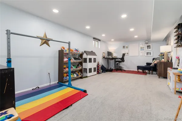 a very nice looking room with a dining table chairs and a large window