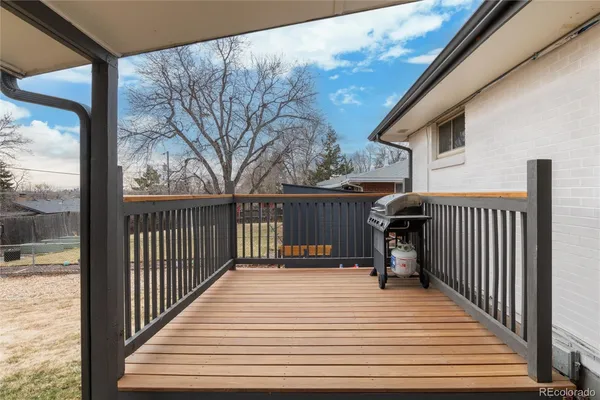 a balcony view with a seating space