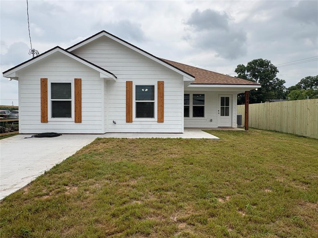 204 North Wiebusch Street Riesel, TX 76682 - Photo 26 of 33 a house that has a tree in front of it