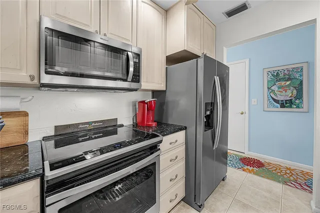 a bedroom with a bed and a desk