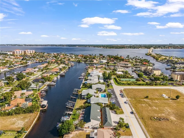 an aerial view of a chairs and table on the terrace