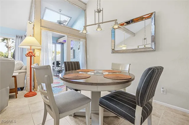 a kitchen with kitchen island granite countertop a sink and a counter top space