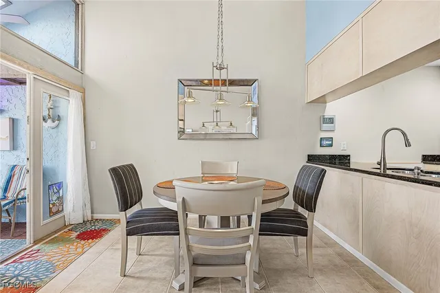 a kitchen with stainless steel appliances granite countertop a stove microwave and refrigerator