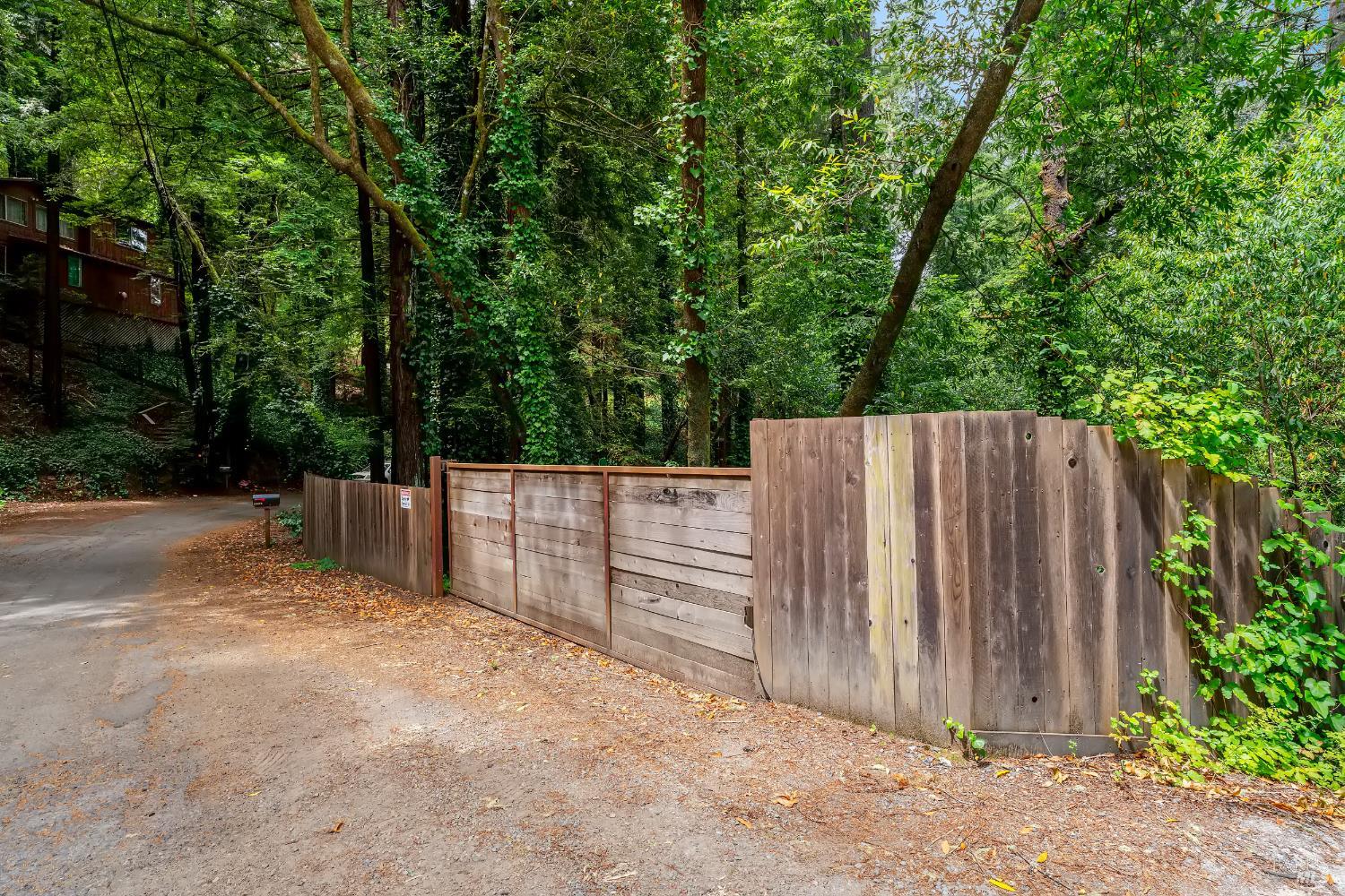 18475 Old Monte Rio Road Guerneville, CA 95446 - Photo 42 of 64 Wide side gate that can open with more storage space, potential RV/boat parking and possibly drive car all the way down to the cabin