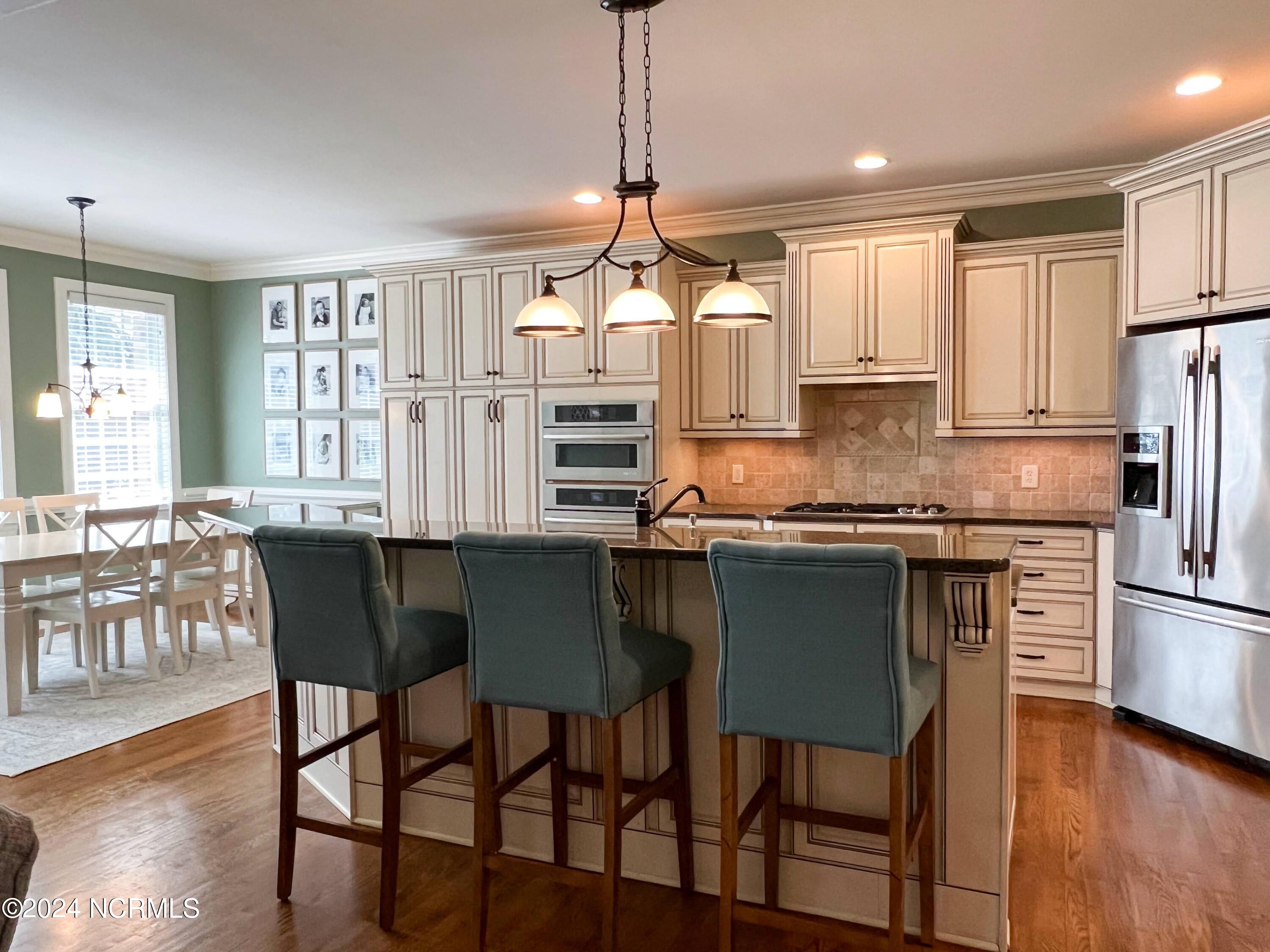 1431 Devon Drive Grimesland, NC 27837 - Photo 22 of 58 Kitchen Island