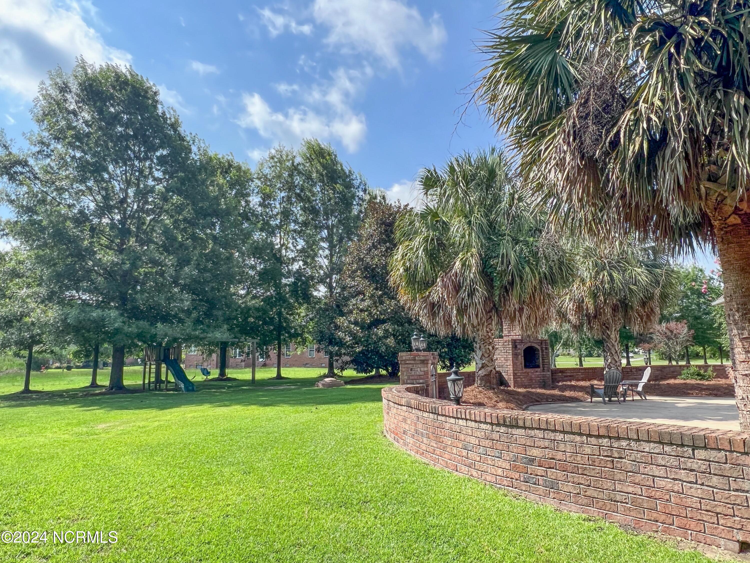 1431 Devon Drive Grimesland, NC 27837 - Photo 9 of 58 Back Yard