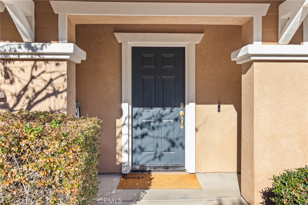 2614 Bellevue Way Palmdale, CA 93550 - Photo 4 of 28 a view of a entryway door of the house