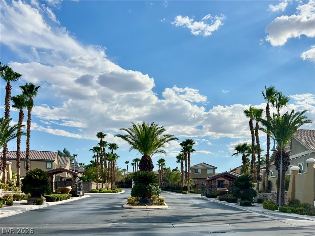 151 Short Ruff Way Las Vegas, NV 89148 - Photo 16 of 17 "The Collections" Gated Subdivision in Rhodes Ranch. Palm-lined streets guide the way through this secure, gated desert neighborhood.