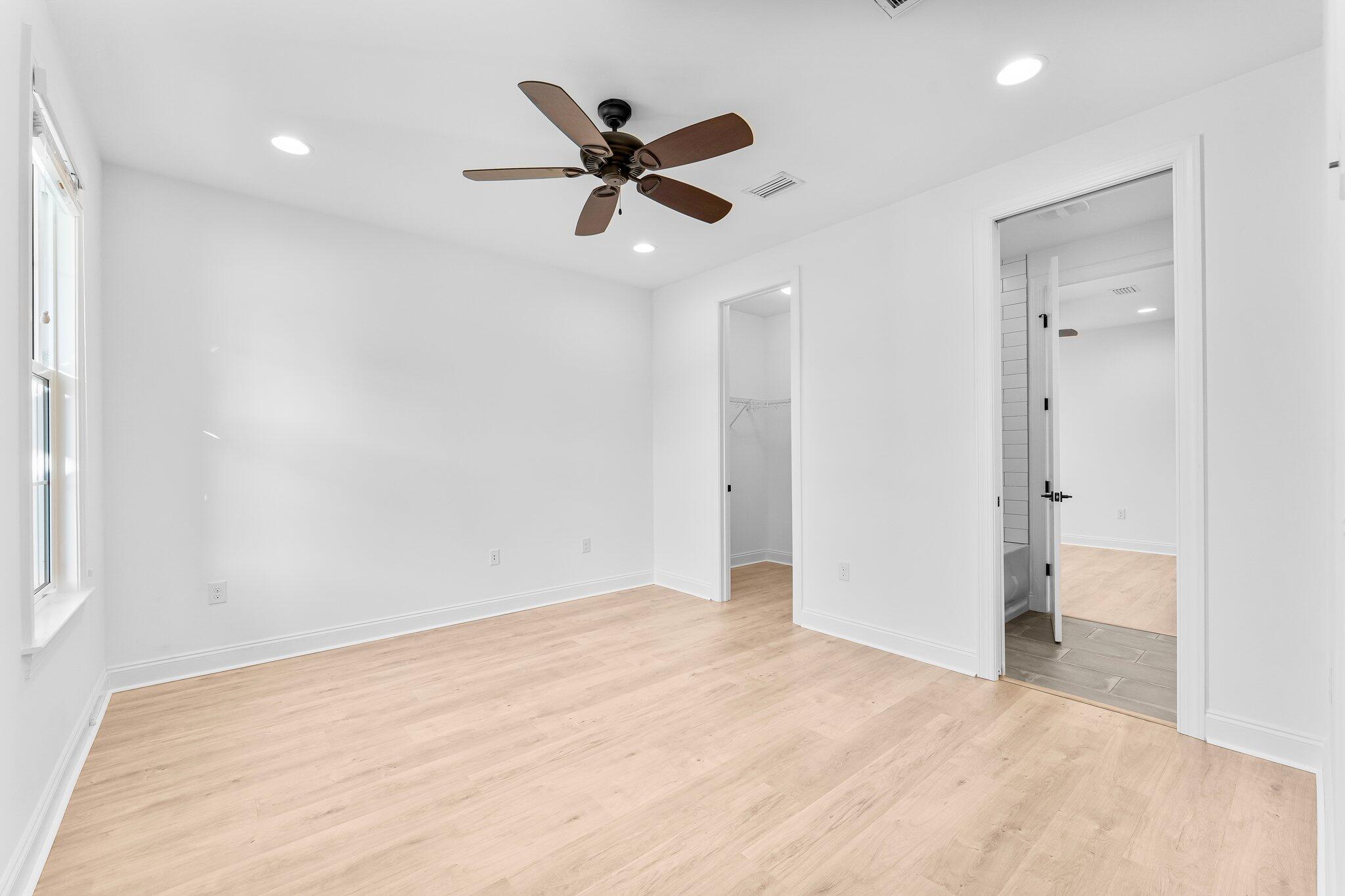 95 Conifer Ct Inlet Beach Inlet Beach, FL 32461 - Photo 15 of 33 a view of a livingroom with a ceiling fan and window