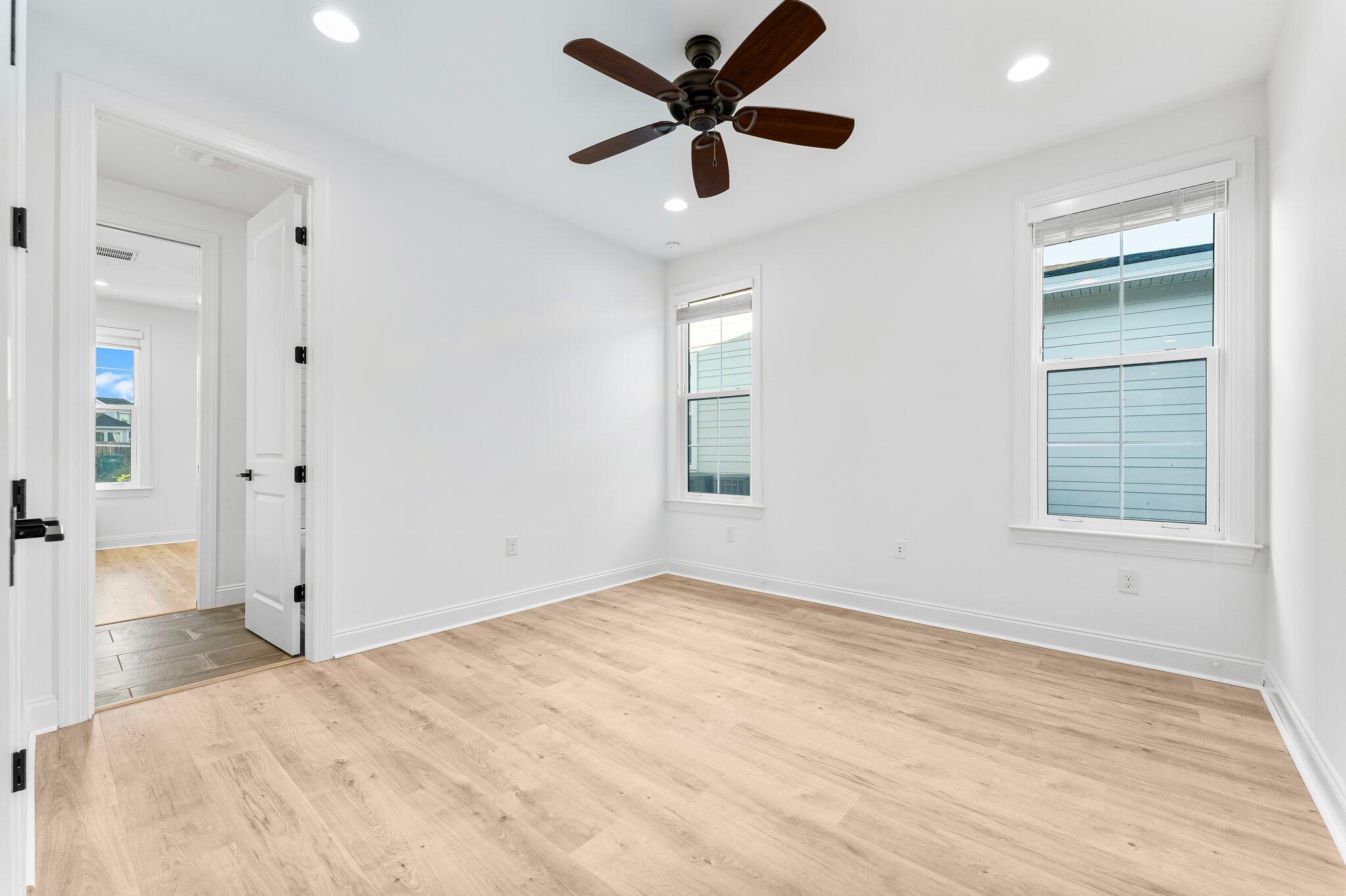 95 Conifer Ct Inlet Beach Inlet Beach, FL 32461 - Photo 19 of 33 a view of a livingroom with a ceiling fan and window