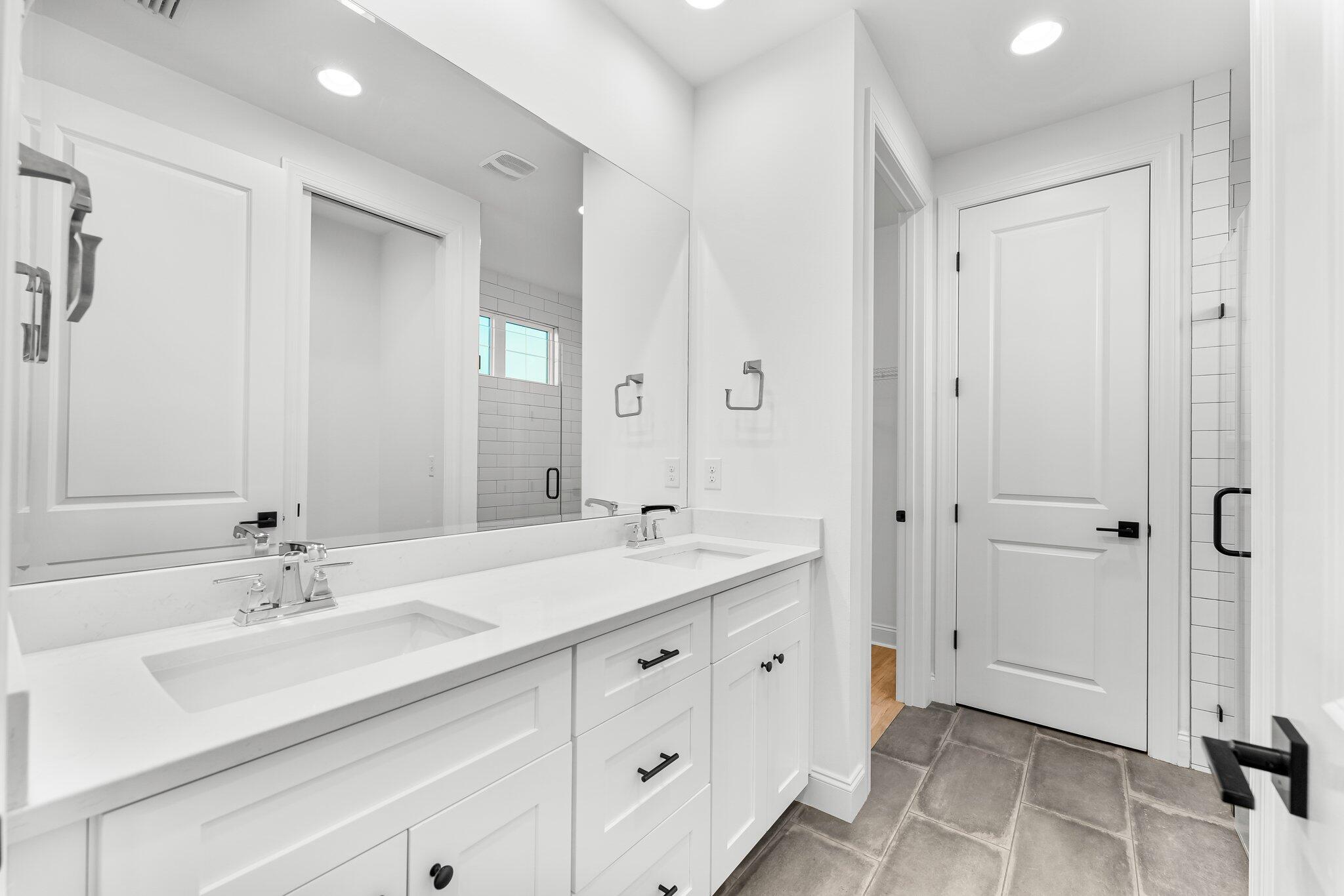 95 Conifer Ct Inlet Beach Inlet Beach, FL 32461 - Photo 23 of 33 a spacious bathroom with a double vanity sink mirror and