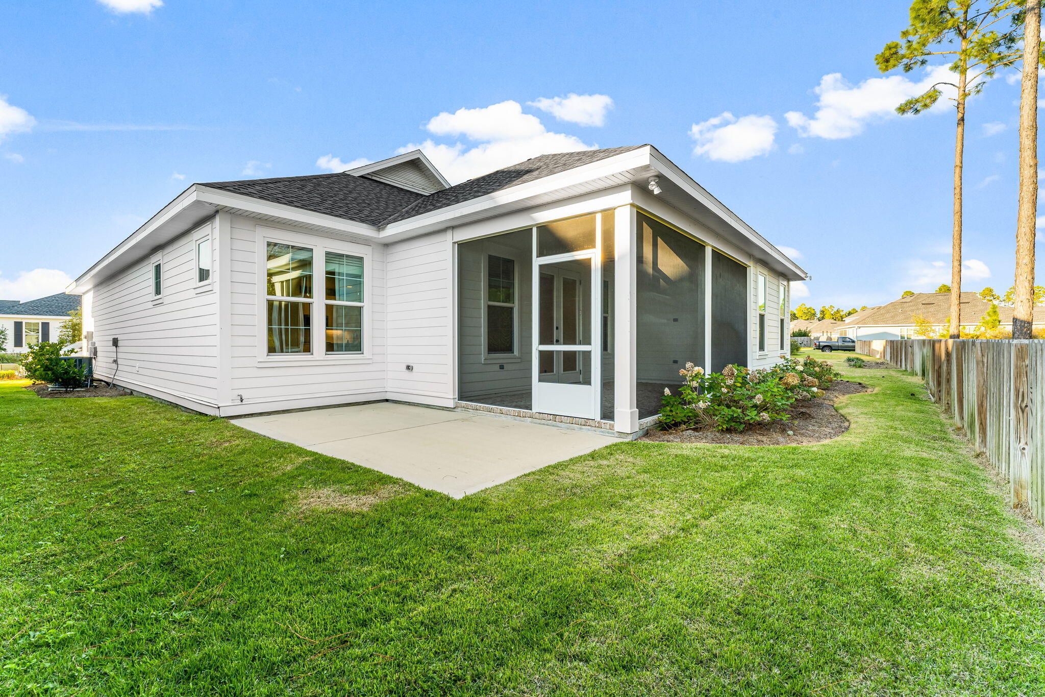 95 Conifer Ct Inlet Beach Inlet Beach, FL 32461 - Photo 28 of 33 a view of a house with a backyard