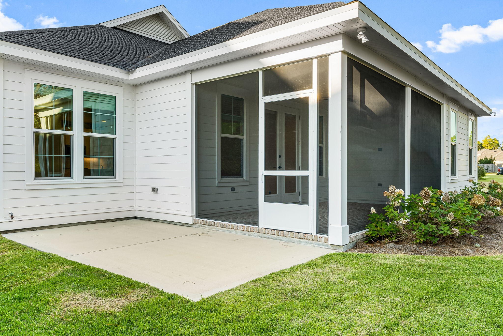 95 Conifer Ct Inlet Beach Inlet Beach, FL 32461 - Photo 29 of 33 a view of an house with backyard and porch