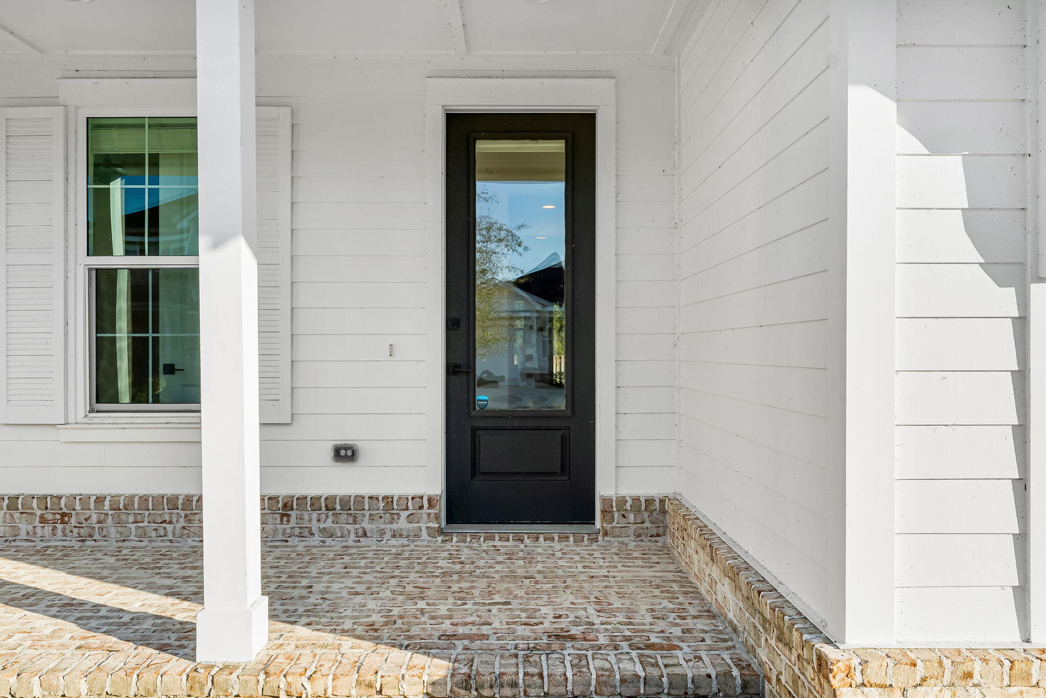 95 Conifer Ct Inlet Beach Inlet Beach, FL 32461 - Photo 5 of 33 a view of a door and a window