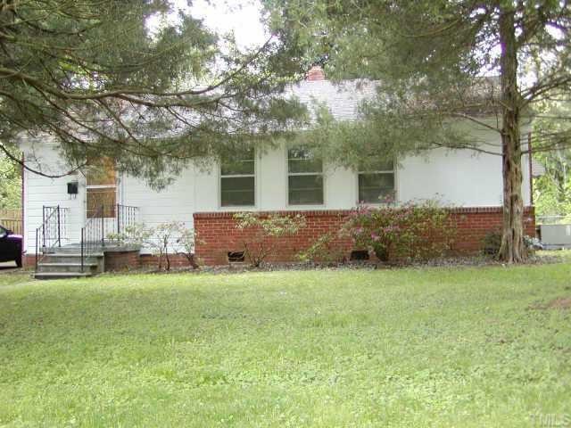 Charming brick and wood ranch. The azaleas in front are starting to bloom! Exterior Front