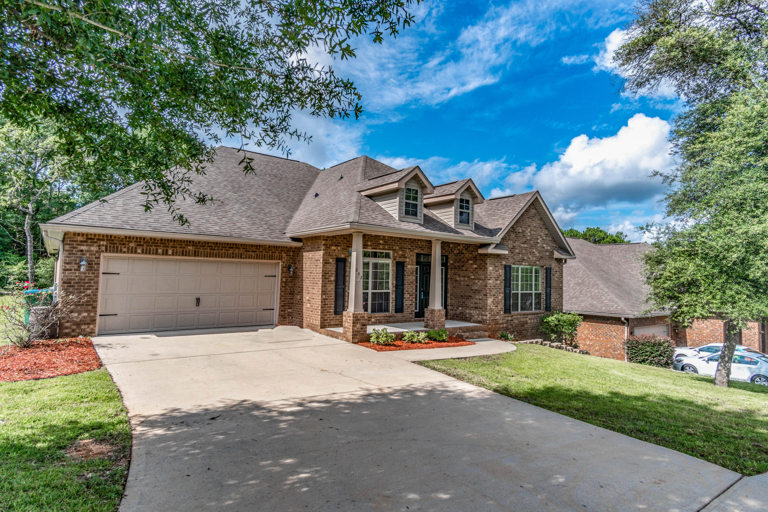 642 Red Fern Road Crestview, FL 32536 - Photo 1 of 32 a front view of a house with a yard