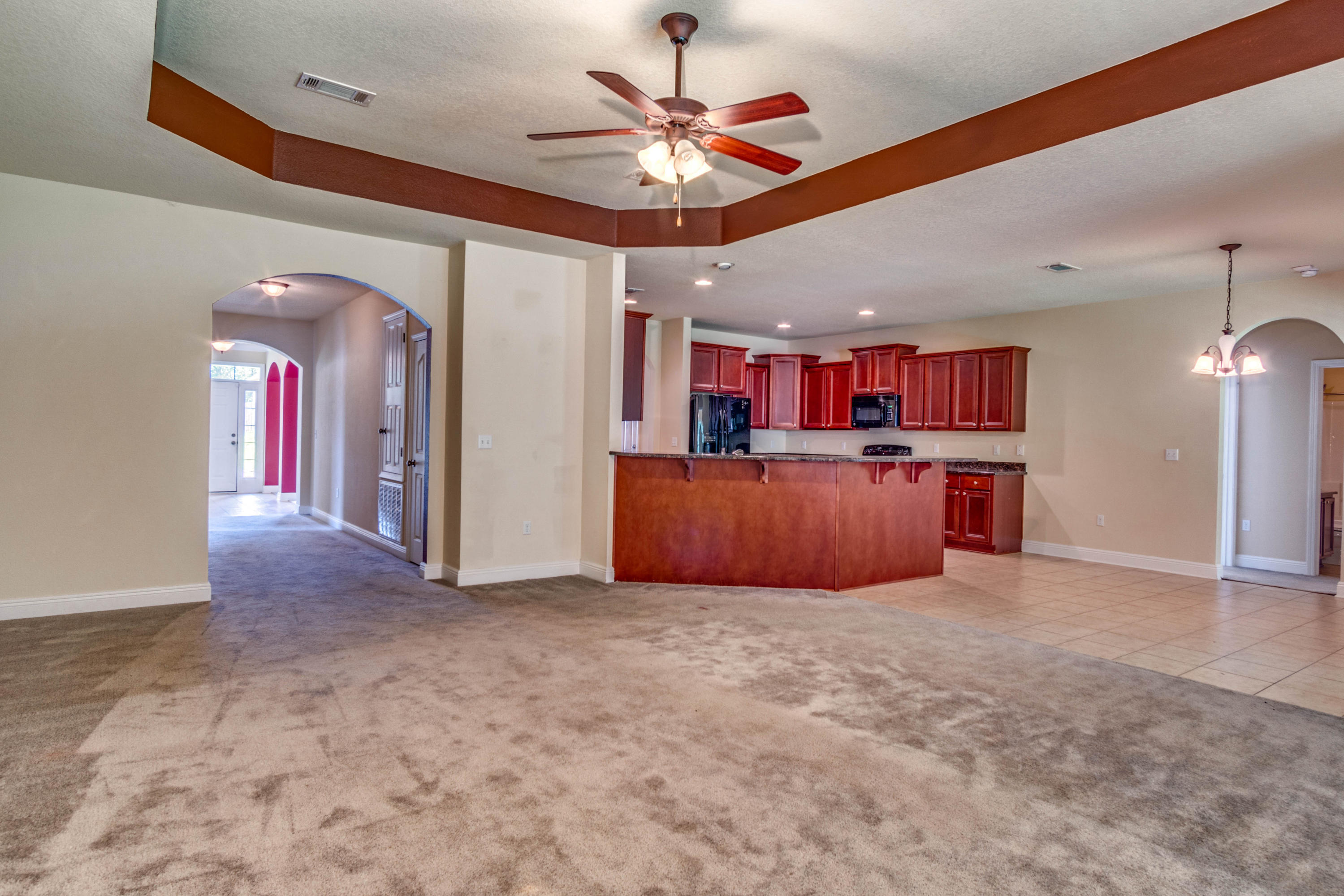 642 Red Fern Road Crestview, FL 32536 - Photo 11 of 32 a view of a livingroom with furniture and chandelier fan