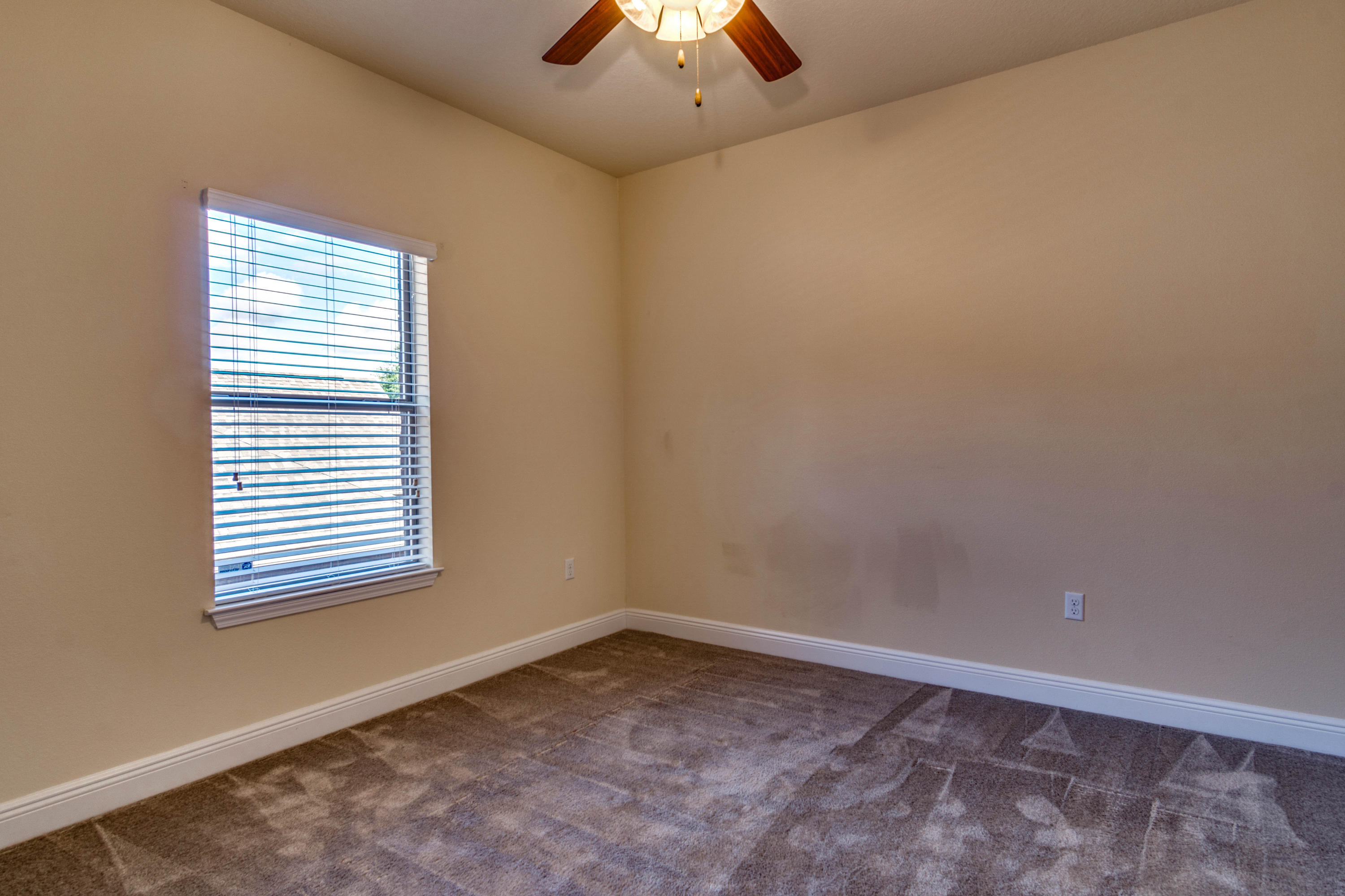 642 Red Fern Road Crestview, FL 32536 - Photo 17 of 32 an empty room with a window