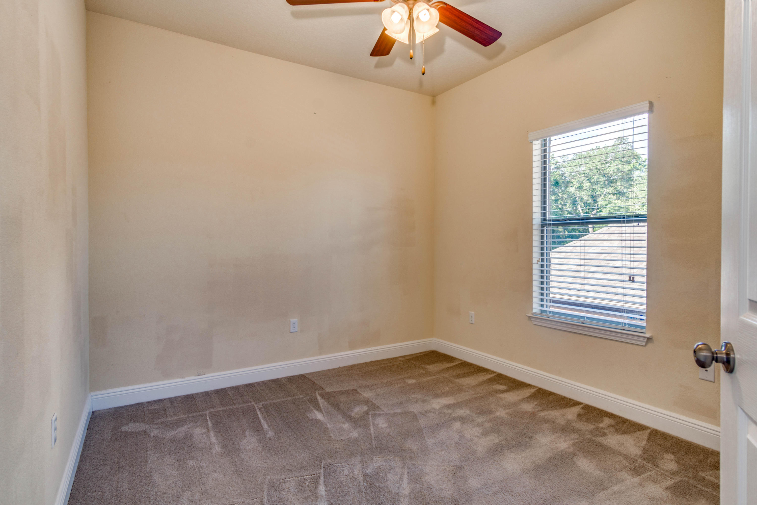 642 Red Fern Road Crestview, FL 32536 - Photo 19 of 32 an empty room with a window