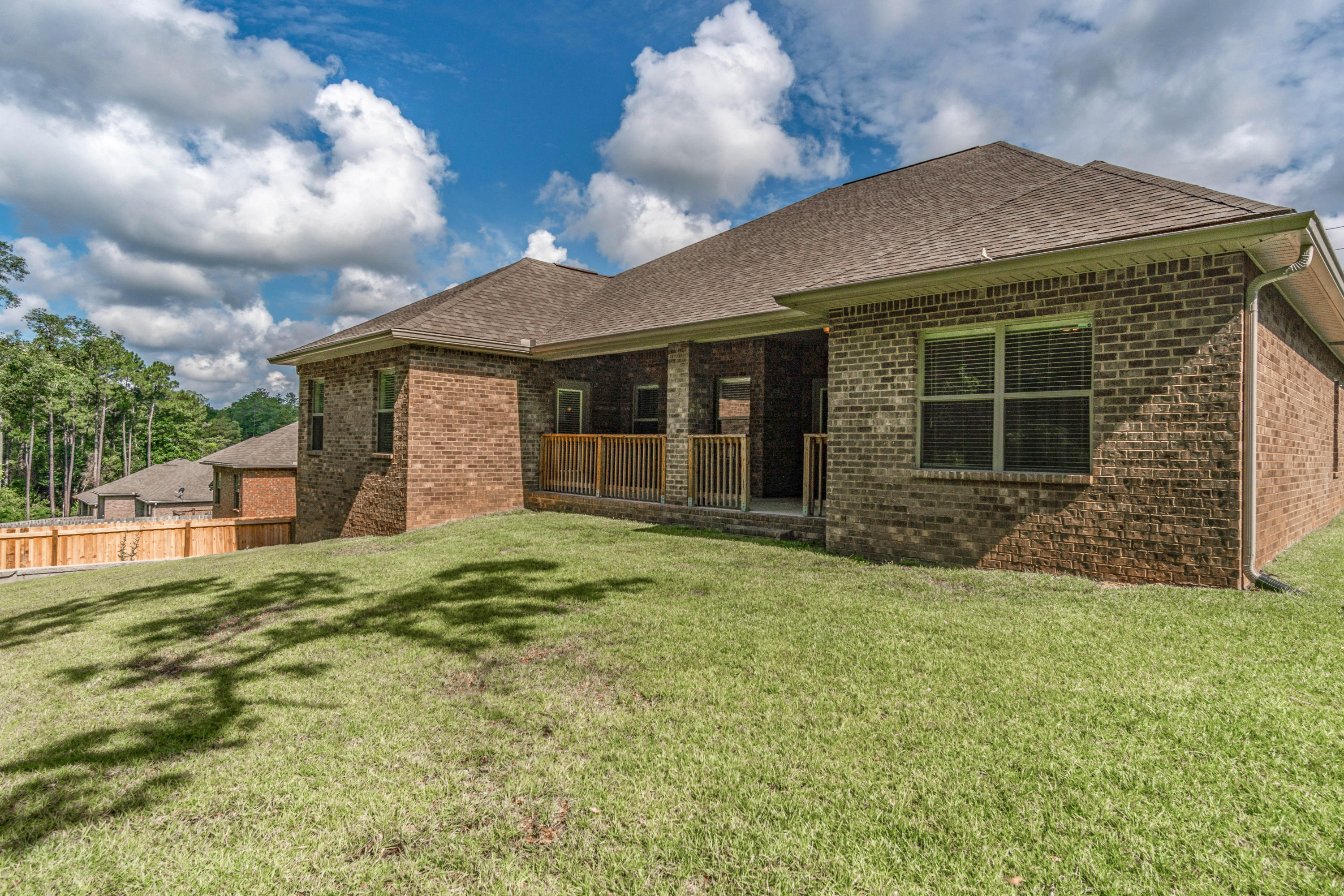 642 Red Fern Road Crestview, FL 32536 - Photo 5 of 32 a front view of a house with a yard