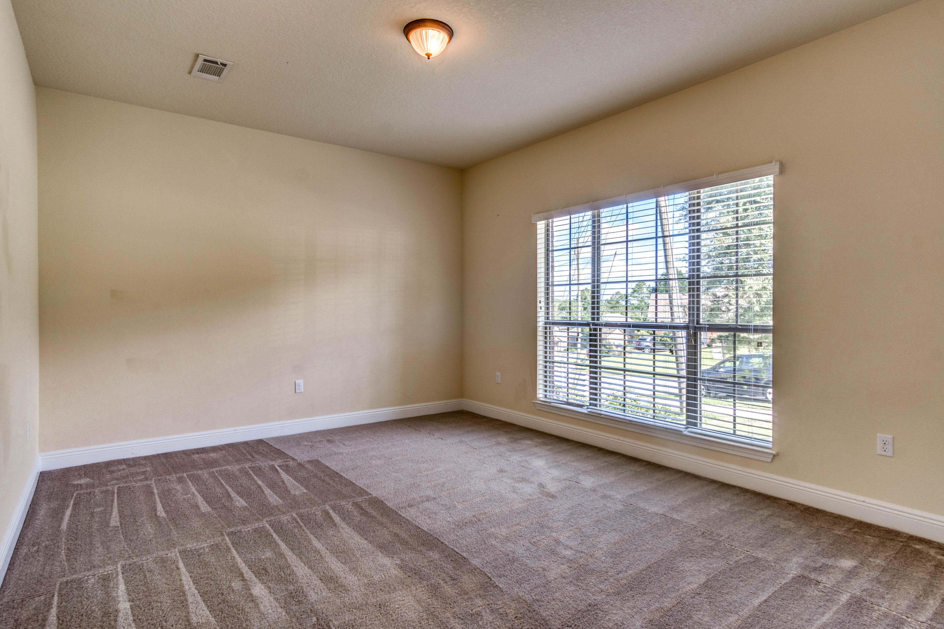 642 Red Fern Road Crestview, FL 32536 - Photo 8 of 32 a view of an empty room with a window