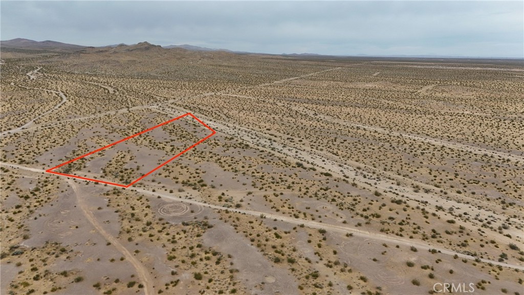 725 Desert Flower Road Adelanto, CA 92301 - Photo 2 of 11 Red boundary lines on pictures are an estimate and for marketing purposes only. Buyer to verify all aspects of this property including, but not limited to utilities, assessments, boundaries, usage, access, and zoning to satisfy themselves.