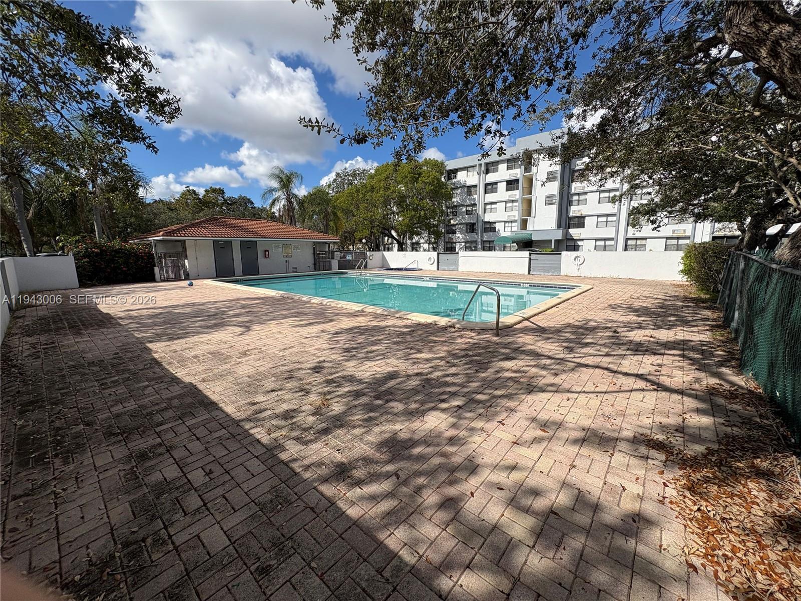 2401 Riverside Drive, Unit 314B Coral Springs, FL 33065 - Photo 16 of 16 a view of backyard of the house