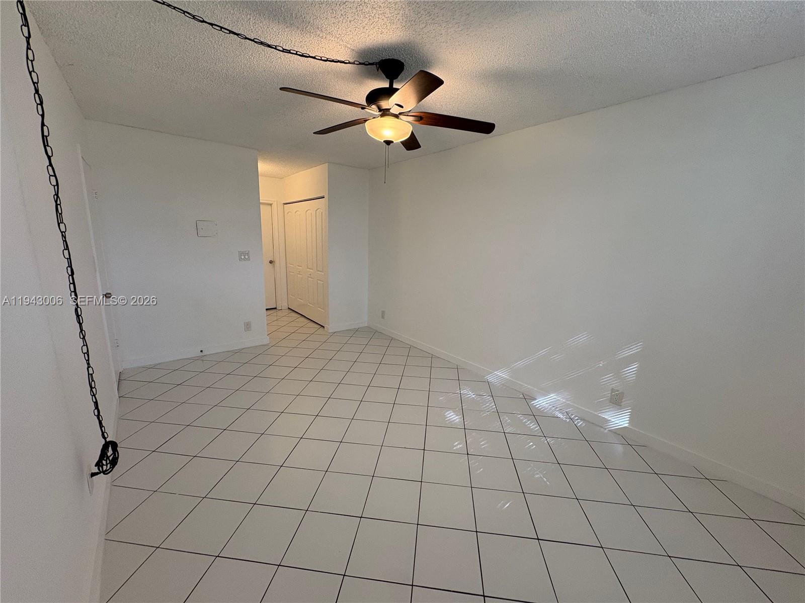 2401 Riverside Drive, Unit 314B Coral Springs, FL 33065 - Photo 8 of 16 a view of an empty room and window