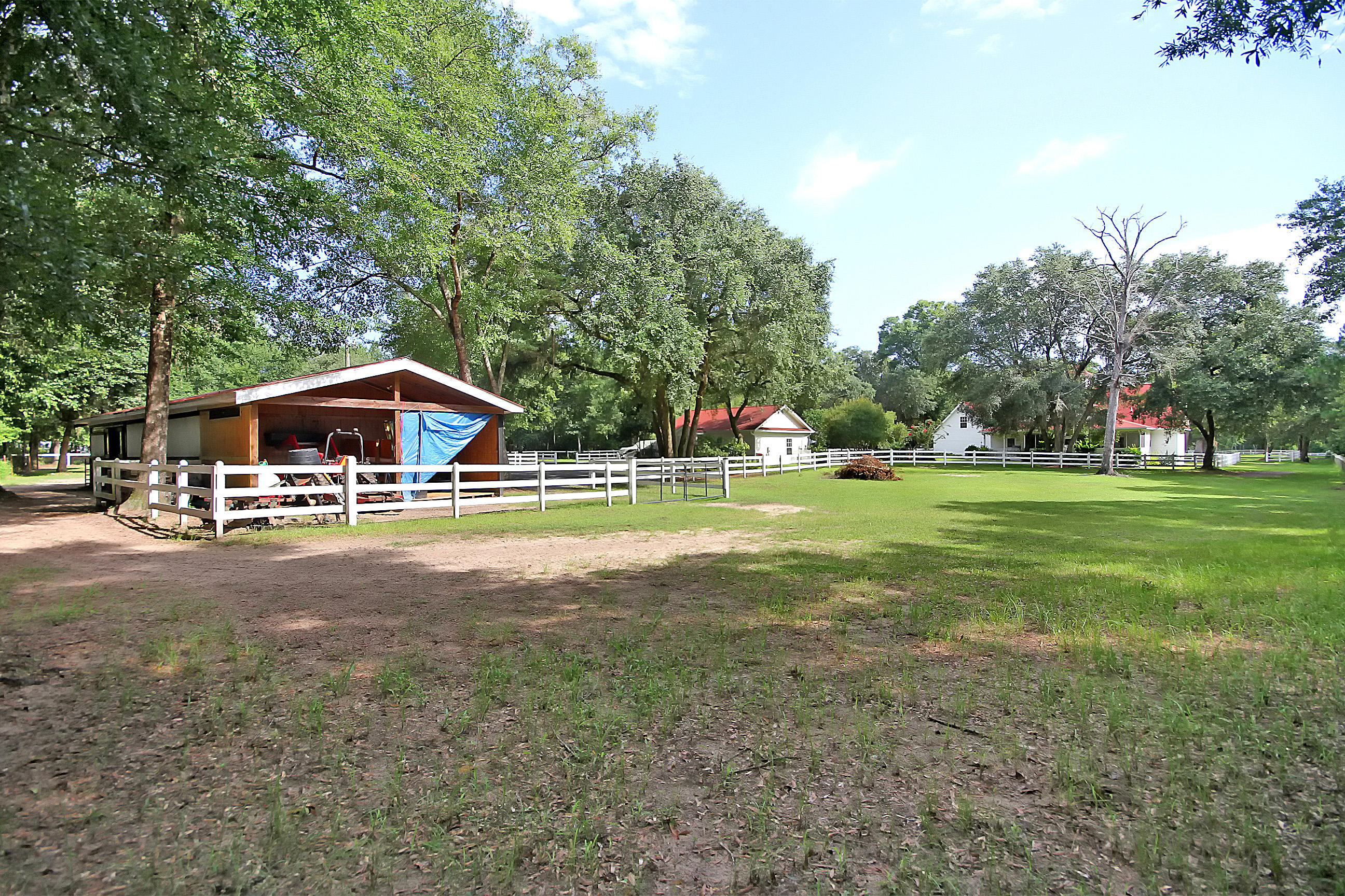 5207 County Line Road Ravenel, SC 29470 - Photo 38 of 43 Pasture with Stable