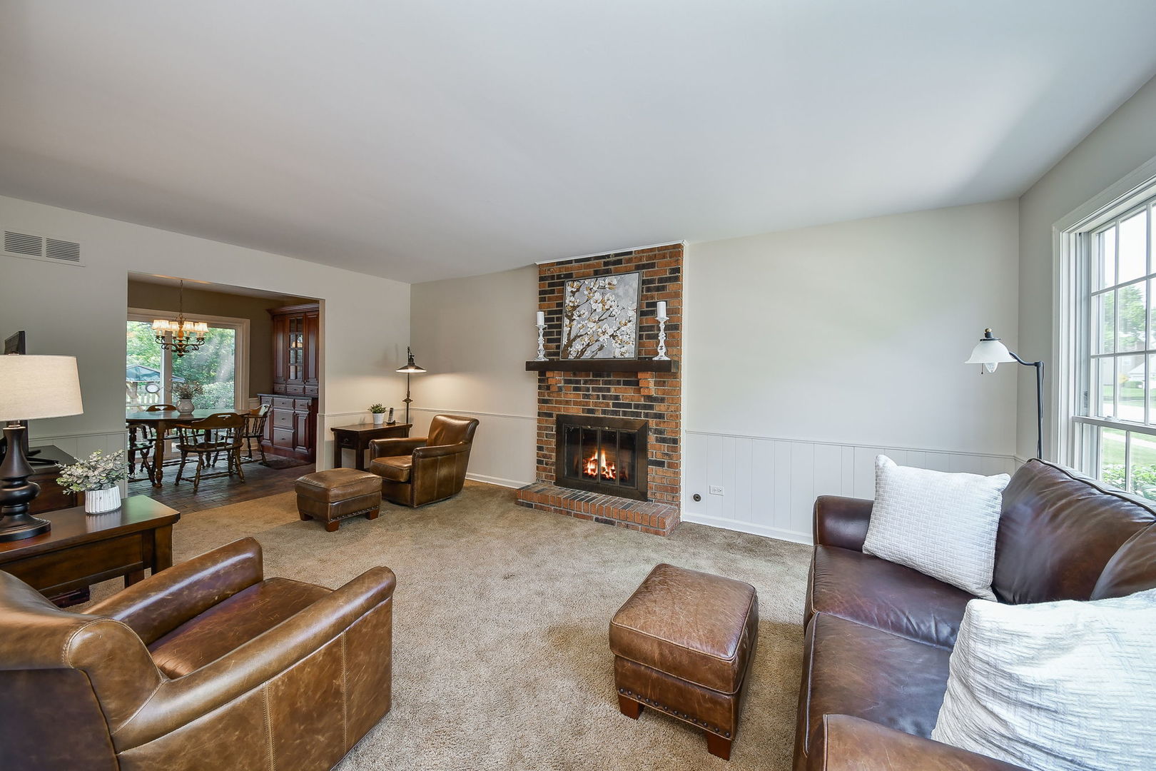 116 West Bailey Road Naperville, IL 60565 - Photo 8 of 27 a living room with furniture and a fireplace