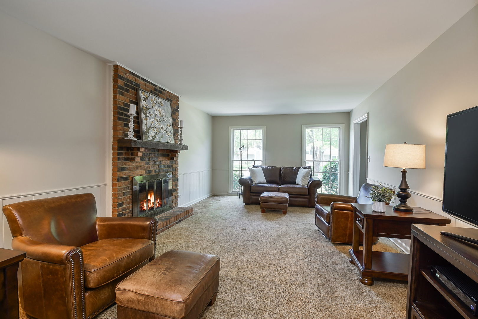 116 West Bailey Road Naperville, IL 60565 - Photo 9 of 27 a living room with furniture fireplace and a window