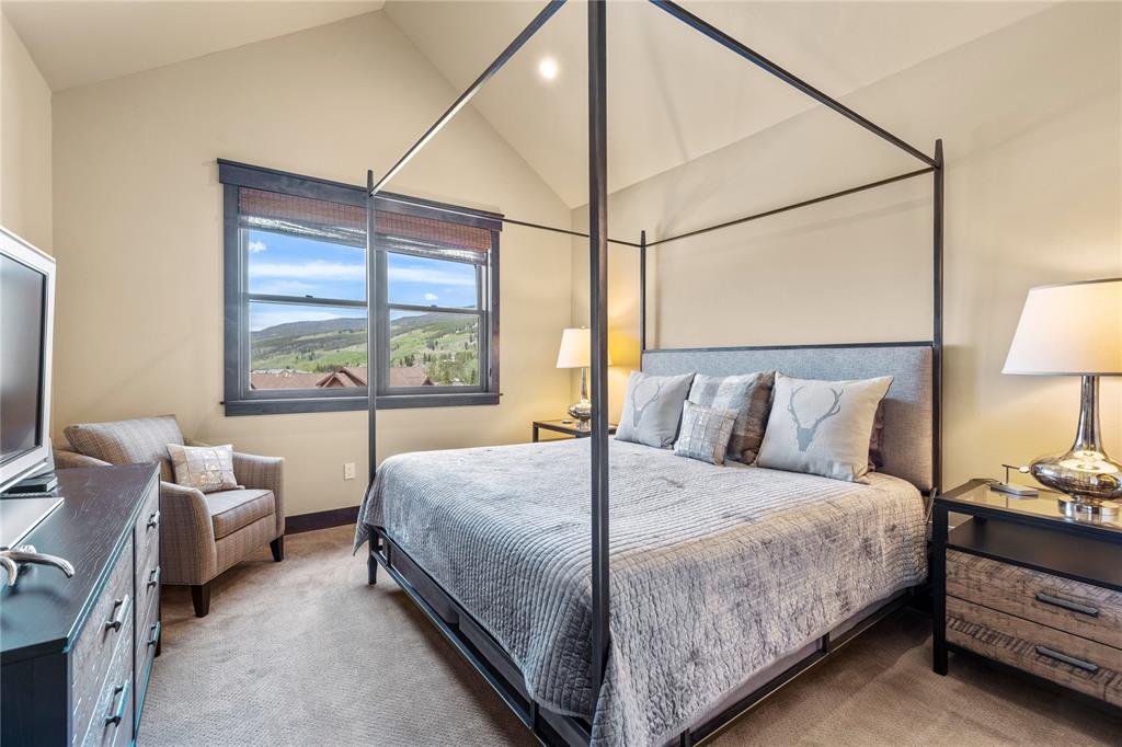 874 Independence Road, Unit 874 Keystone, CO 80435 - Photo 22 of 35 a bedroom with a bed and a couch