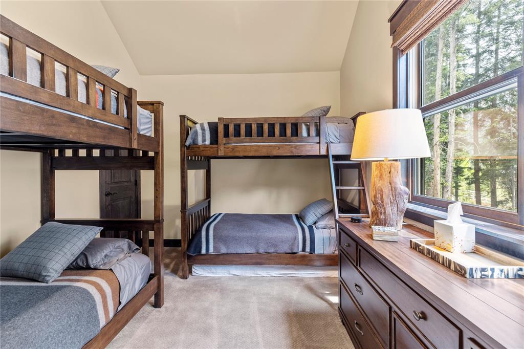874 Independence Road, Unit 874 Keystone, CO 80435 - Photo 26 of 35 a bedroom with furniture and a window