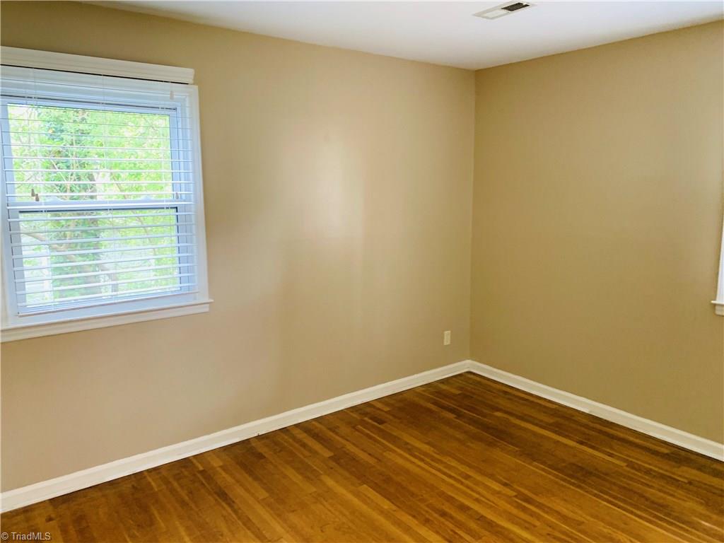 3896 Lewiston Road Summerfield, NC 27358 - Photo 9 of 16 All the bedrooms feature the original refinished hardwood flooring.