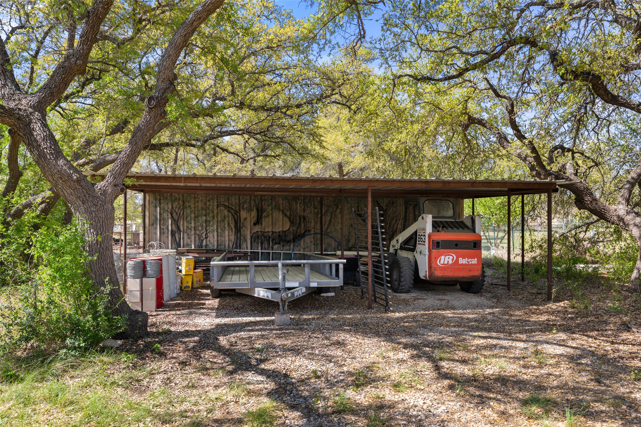 546 Lazy Oak Road Hye, TX 78635 - Photo 24 of 34 a view of car parked in garage