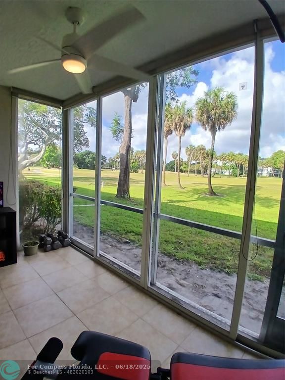 907 Cypress Terrace, Unit 104 Pompano Beach, FL 33069 - Photo 23 of 40 a view of a garden and porch