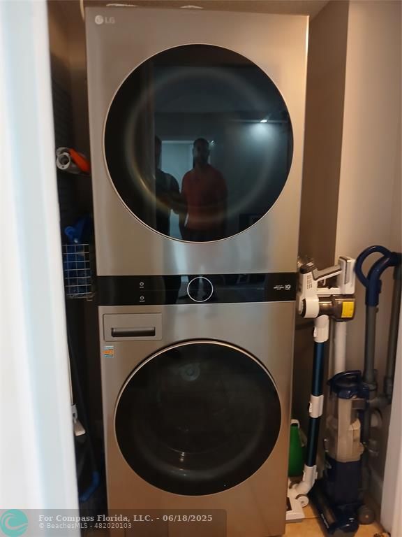 907 Cypress Terrace, Unit 104 Pompano Beach, FL 33069 - Photo 26 of 40 a close up view of a washer and dryer